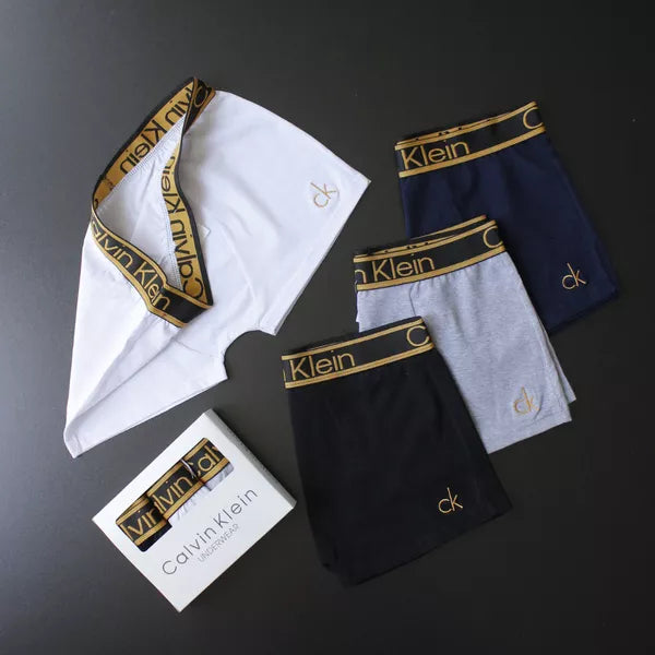 CUECA BOX MASCULINA CALVIN KLEIN - COMPRE 1, LEVE 3 - CORES VARIADAS - CÓS DOURADO